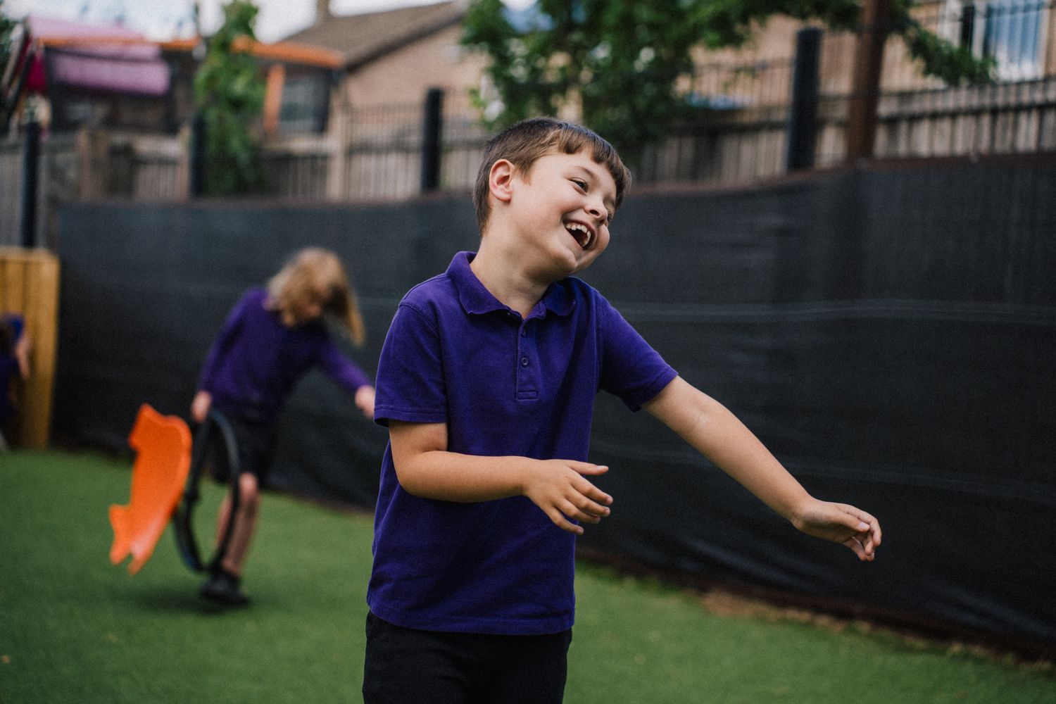 Pupil playing outdoors at Marshlands School, Stafford